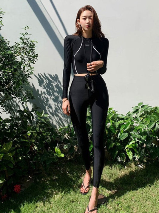 Sleek Black Long-Sleeve Rash Guard Set with Leggings