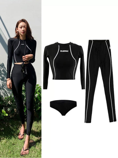 Sleek Black Long-Sleeve Rash Guard Set with Leggings